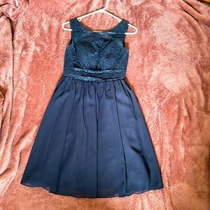 Dark blue mid length dress, worn once. Modest. Size 2-4